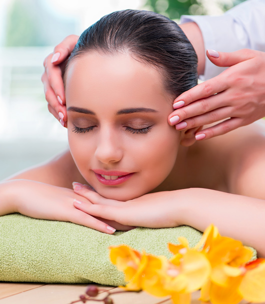Woman getting a haircut at a salon